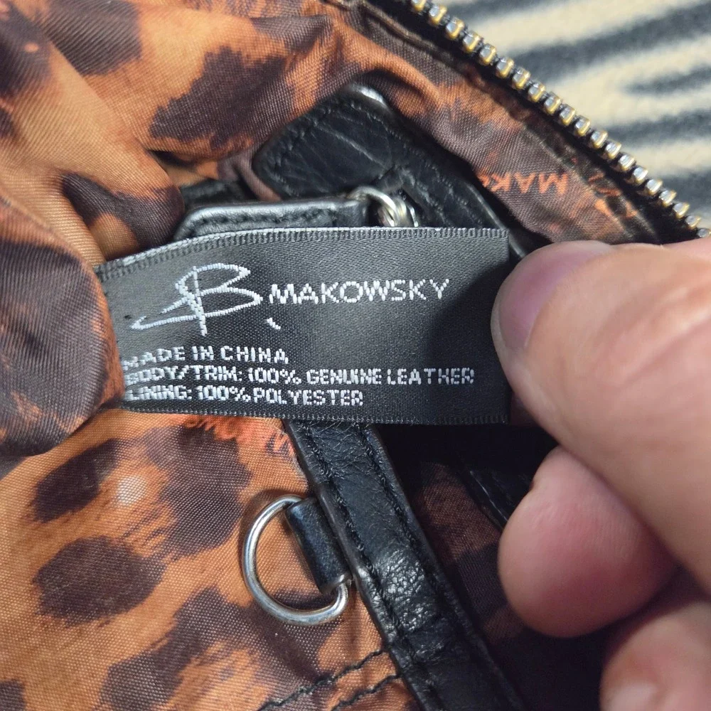 B. Makowsky Black Pebbled Leather Crossbody Bag Pleated Tassel Leopard Print